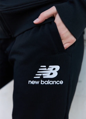 Женские Брюки NB Ess FT Черный New Balance (260955854)