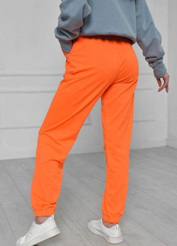 Спортивні штани жіночі яскраво-помаранчевого кольору Let's Shop (266901133)