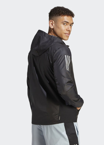 Чорна демісезонна вітровка own the run adidas