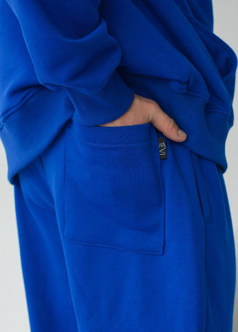 Светло-синий демисезонный костюм брючный Garna