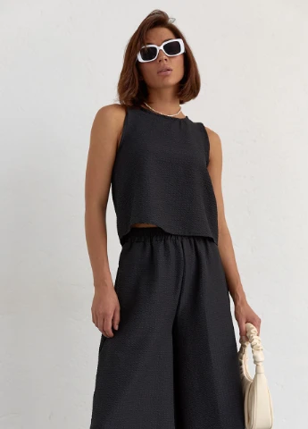 Жіночий костюм з кюлотами та топом без рукавів - чорний Lurex (262810527)