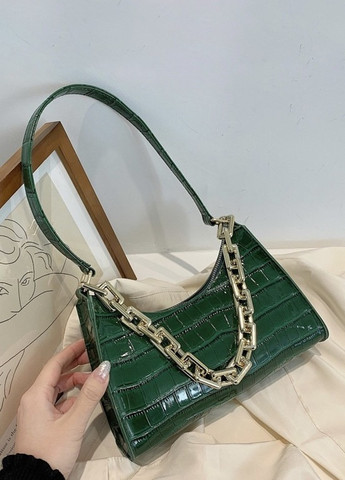 Жіноча маленька сумка рептилія багет крокодиляча шкіра з ланцюжком зелена No Brand (259473649)