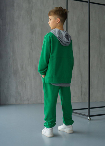 Зеленый демисезонный костюм брючный Garna