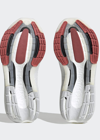 Помаранчеві всесезонні кросівки ultraboost light adidas