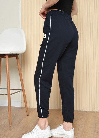 Спортивні штани жіночі темно-синього кольору Let's Shop (260596374)