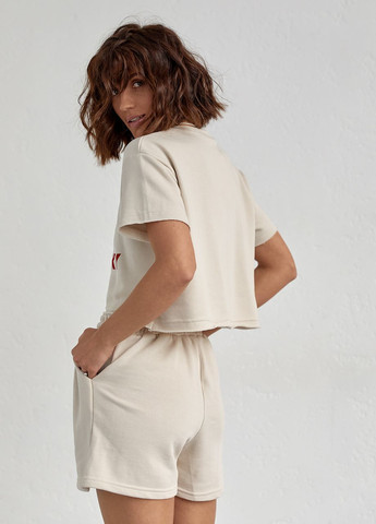 Жіночий спортивний комплект із шортами та футболкою - бежевий Lurex (262810610)