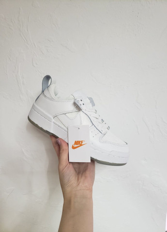 Білі шкіряні кросівки Nike