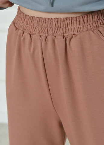 Спортивні штани жіночі темно-рожевого кольору Let's Shop (266901162)