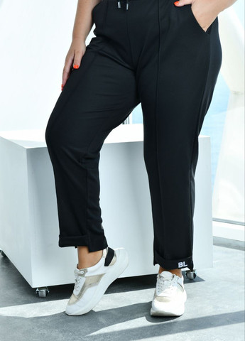 Жіночі брюки чорного кольору р.48 376002 New Trend (259214881)
