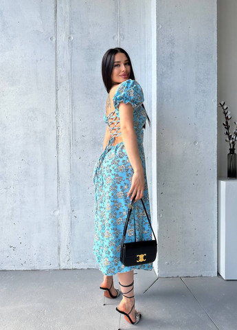 Светло-голубое кэжуал неймовірна сукня міді зі спинкою на шнурівці Vakko с цветочным принтом
