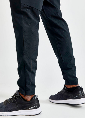 Черные спортивные демисезонные брюки Craft