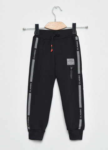 Спортивні штани дитячі для хлопчика на флісі чорного кольору Let's Shop (270364901)