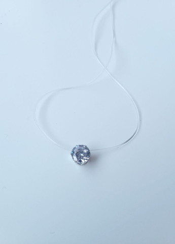 Кулон білий прозорий камінчик на волосіні-резинці з кріпленням зірочкою No Brand (276004392)