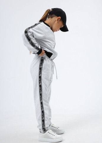 Спортивный костюм на девочку 8980 122 см Белый, черный 67100 Wanex (260551918)