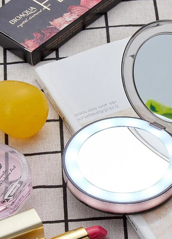 Кишенькове дзеркало для макіяжу з LED підсвічуванням 8.5х1.75 см UFT cm2 (259110748)