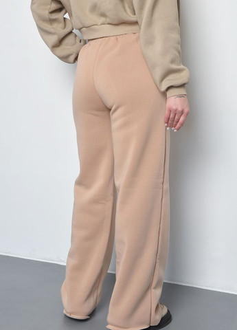 Спортивні штани жіночі на флісі бежевого кольору Let's Shop (270364806)