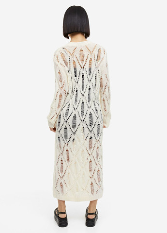Бежевое повседневный трикотажное платье H&M с абстрактным узором