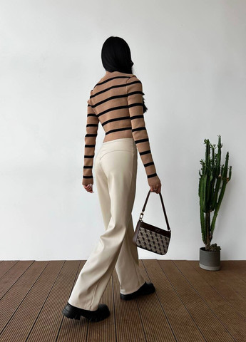 Жіночі штани з еко-шкіри колір молочний р.42 443402 New Trend (266424146)