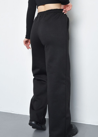 Спортивні штани жіночі на флісі чорного кольору Let's Shop (270364818)