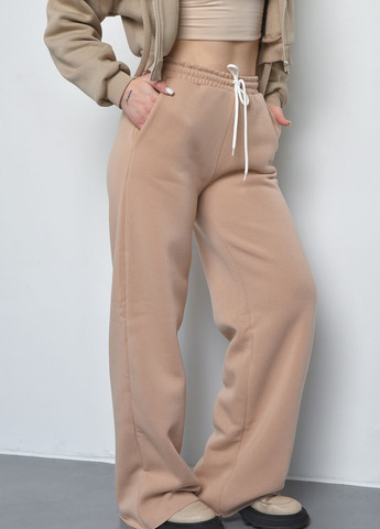 Спортивні штани жіночі на флісі бежевого кольору Let's Shop (270364806)