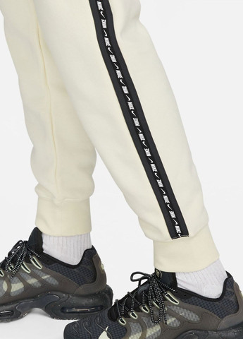 Бежевые брюки Nike