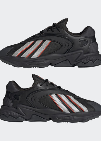 Чорні всесезонні кросівки oztral adidas