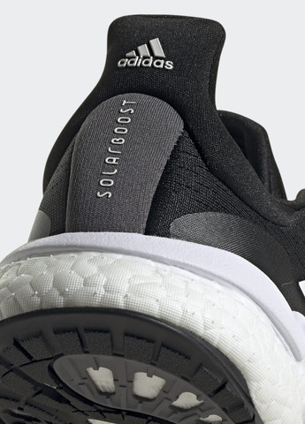 Черные всесезонные кроссовки для бега solarboost 4 adidas