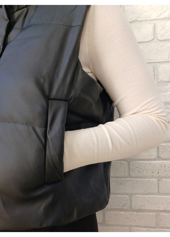 Жіночий жилет без капюшона з кишенями із еко шкіри No Brand (361221250)