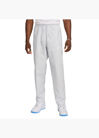 Белые демисезонные брюки Nike