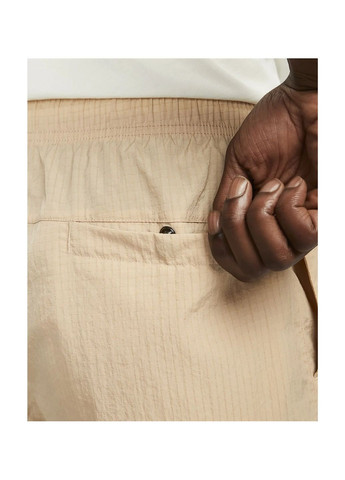 Бежевые демисезонные брюки Nike