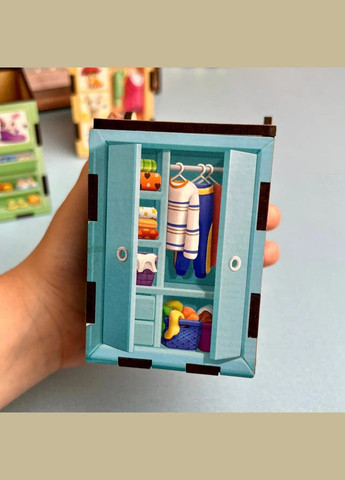 Дерев'яна настільна гра "Шафи з одягом" (ПСД061) PSD061 сортер-комодик Ubumblebees (302386410)