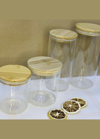 Ємність для сипких продуктів скляна кругла з бамбуковою кришкою 15 см No Brand (328905623)