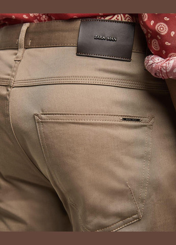 Бежевые брюки Zara