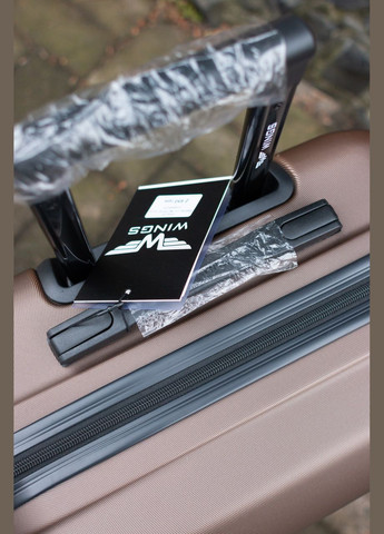 Валіза пластикова ручна поклажа S коричневий Wings 148 (323016925)