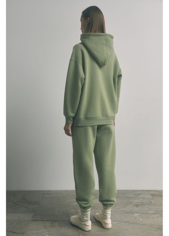 Салатовое демисезонное Женское пальто Йораль 140961 Stimma