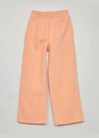 Персиковые брюки Kiabi