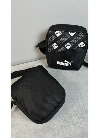 Барсетка в чорному кольорі - надійний аксесуар для міста No Brand (365762090)