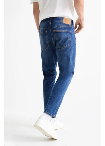 Синие демисезонные джинсы slim tapared C&A