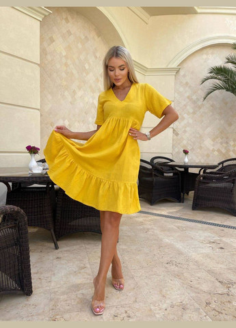 Жовтий легка муслінова сукня жовтого кольору 32681 кльош No Brand однотонна