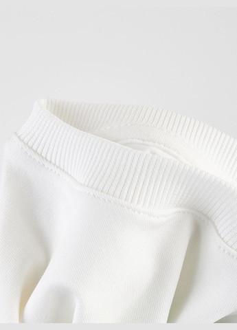 Молочна літня дитяча футболка оверсайз молочна з принтом "personality" KRAKO