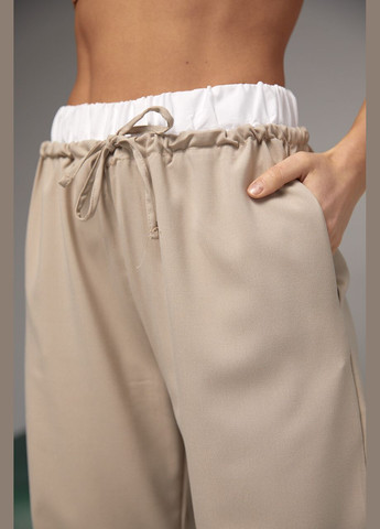 Жіночі брюки на зав'язках з білою гумкою на талії Lurex (278400641)