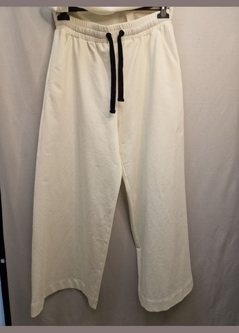 Брюки женские белые трикотажные укороченные широкие Modna KAZKA MKKS204-1 KAPTSOVA (336933451)