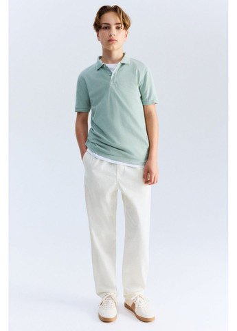 Белые демисезонные брюки H&M