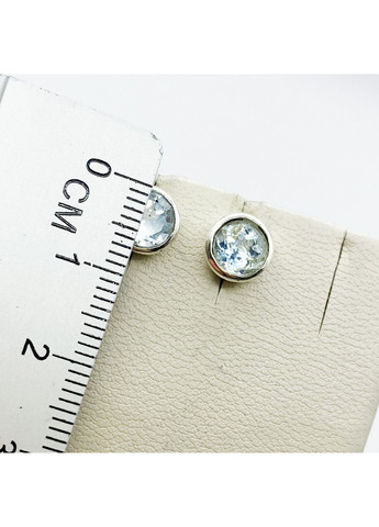 Сережки-гвоздики срібні з блакитним топазом 2 г No Brand (369737375)