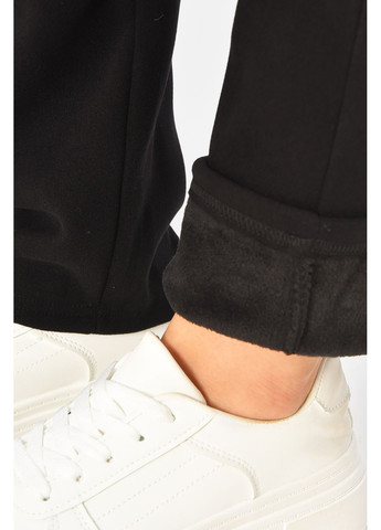 Штани жіночі однотонні на штучному хутрі чорного кольору Let's Shop (364485099)