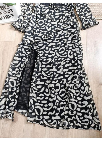 Чорна гарна сукня міді з вирізом на талії. Zara