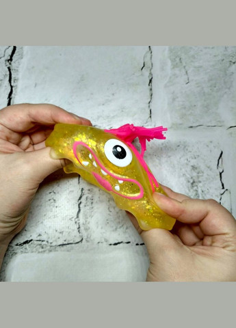 Игрушка антистресс жвачка-тянучка Монстрик 5х6,5 см Желтый No Brand (325428459)