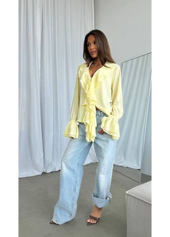 Жовта жіноча блуза з воланами Avanti
