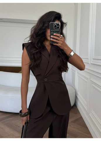 Жіночий костюм без рукавів з приталеним жилетом і широкими штанами Україна (350936706)