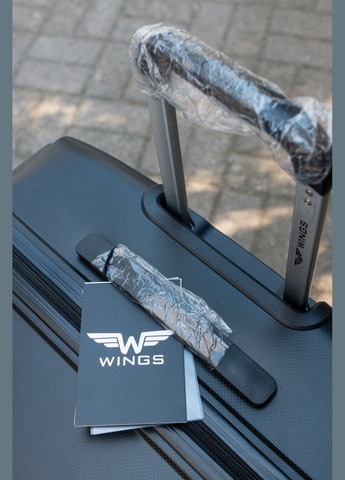 Чемодан полипропилен 100% большой L размер, цвет красный Wings CKT01 (338182635)